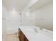 Bright bathroom with shower-tub combo, spacious vanity, and a large mirror at 1123 Union Ave, Mascotte, FL 34753