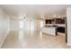 Spacious living room showcasing tile floors and natural light at 1123 Union Ave, Mascotte, FL 34753