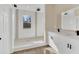 Modern bathroom with a walk-in shower and double vanity at 139 Malauka Pass, Ocklawaha, FL 32179