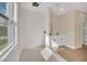 Bright bathroom showcasing a walk-in shower, dual sinks, and modern fixtures at 139 Malauka Pass, Ocklawaha, FL 32179