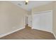 Spacious bedroom with double closets and wood-look floors at 139 Malauka Pass, Ocklawaha, FL 32179