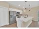 Modern kitchen with stainless steel appliances and island at 139 Malauka Pass, Ocklawaha, FL 32179
