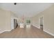 Open concept kitchen with island and stainless steel appliances at 139 Malauka Pass, Ocklawaha, FL 32179