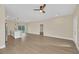 Spacious living room featuring hardwood floors at 139 Malauka Pass, Ocklawaha, FL 32179