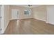 Living room featuring hardwood floors, natural light and neutral paint at 139 Malauka Pass, Ocklawaha, FL 32179