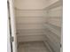 Walk-in pantry with wire shelving, providing ample storage space at 2063 Town Pasture Dr, Eustis, FL 32726