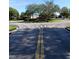 Community circular roadway with landscaping at 428 Palastro Ave, Auburndale, FL 33823