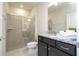 Bathroom with a large shower and granite countertops at 4294 Lana Ave, Davenport, FL 33897