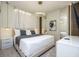 Bedroom featuring modern lighting and furnishings and a queen-sized bed at 4294 Lana Ave, Davenport, FL 33897
