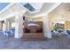 Outdoor dining area with Windsor Island Resort sign and ample seating, perfect for relaxed meals and social gatherings at 4294 Lana Ave, Davenport, FL 33897