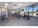 Bright community gym featuring modern exercise equipment, large windows, and ceiling fans for a comfortable workout at 4294 Lana Ave, Davenport, FL 33897