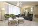 Spacious living area with modern decor, comfortable seating, and dining room view at 4294 Lana Ave, Davenport, FL 33897