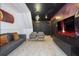 Living room with Star Wars themed decor, large screen television and seating at 4294 Lana Ave, Davenport, FL 33897