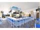 An enormous outdoor pool bar featuring light countertops, many TVs, and seating for dozens of patrons at 4294 Lana Ave, Davenport, FL 33897