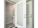 Convenient powder room with pedestal sink, accessible from the outdoor patio at 4294 Lana Ave, Davenport, FL 33897