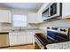 Stainless steel appliances and granite countertops in kitchen at 441 Danube Dr, Kissimmee, FL 34759
