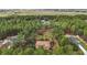 Property surrounded by trees, showing house and lot size at 6900 Sw 137Th Court Rd, Ocala, FL 34481