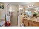 Updated bathroom with walk-in shower and modern fixtures at 6900 Sw 137Th Court Rd, Ocala, FL 34481