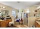 Bathroom with a soaking tub, shower, and double vanity at 6900 Sw 137Th Court Rd, Ocala, FL 34481