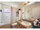 Clean bathroom with a shower/tub combo, vanity, and linen storage at 6900 Sw 137Th Court Rd, Ocala, FL 34481