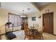 Cozy breakfast nook with a glass table and chairs at 6900 Sw 137Th Court Rd, Ocala, FL 34481