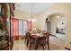 Formal dining room with a wood table and chairs at 6900 Sw 137Th Court Rd, Ocala, FL 34481