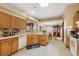 Bright kitchen with an open layout and views into the dining area at 6900 Sw 137Th Court Rd, Ocala, FL 34481