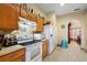 Well-equipped kitchen featuring ample cabinetry and modern appliances at 6900 Sw 137Th Court Rd, Ocala, FL 34481