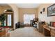 Home office with a desk, window, and ample natural light at 6900 Sw 137Th Court Rd, Ocala, FL 34481