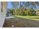 Large backyard with grassy area and patio at 1236 Merritt St, Altamonte Springs, FL 32701