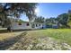 Home exterior view and backyard with grassy area at 1236 Merritt St, Altamonte Springs, FL 32701