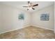 Bright bedroom with tile floors and a ceiling fan at 1236 Merritt St, Altamonte Springs, FL 32701