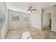 Bedroom with tile floors, double closet, and ceiling fan at 1236 Merritt St, Altamonte Springs, FL 32701