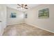 Well-lit bedroom featuring tile floors and a ceiling fan at 1236 Merritt St, Altamonte Springs, FL 32701