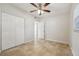 Spacious bedroom with double closet and ceiling fan at 1236 Merritt St, Altamonte Springs, FL 32701
