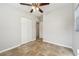 Bedroom with double closet and ceiling fan at 1236 Merritt St, Altamonte Springs, FL 32701