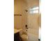 Bathroom with bathtub, shower, and marble-look tile at 1712 Lake Alden Dr, Apopka, FL 32712
