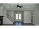 Bright and spacious entryway with double doors and staircase at 1712 Lake Alden Dr, Apopka, FL 32712