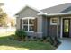 House exterior with landscaping and shutters at 1712 Lake Alden Dr, Apopka, FL 32712