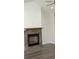 Cozy fireplace with stone surround in living room at 1712 Lake Alden Dr, Apopka, FL 32712