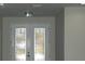Elegant front door with stained glass accents at 1712 Lake Alden Dr, Apopka, FL 32712