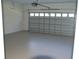 Spacious garage with automatic opener and epoxy floor at 1712 Lake Alden Dr, Apopka, FL 32712