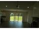 Open living room with sliding doors leading to backyard at 1712 Lake Alden Dr, Apopka, FL 32712
