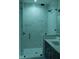 Modern shower with glass enclosure and marble-look tile at 1712 Lake Alden Dr, Apopka, FL 32712