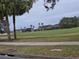 Scenic view of the golf course and palm trees at 501 Heritage Trail St, Kissimmee, FL 34759
