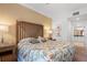 Spacious bedroom with king-size bed and ensuite bathroom at 1364 Centre Court Ridge Dr # 201, Reunion, FL 34747