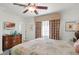 Bedroom with a queen bed and dresser at 1364 Centre Court Ridge Dr # 201, Reunion, FL 34747