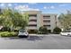 Three-story building with parking and landscaping at 1364 Centre Court Ridge Dr # 201, Reunion, FL 34747