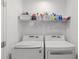 Laundry room with side-by-side washer and dryer at 1364 Centre Court Ridge Dr # 201, Reunion, FL 34747