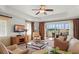 Spacious living room with large windows and comfortable seating at 1364 Centre Court Ridge Dr # 201, Reunion, FL 34747